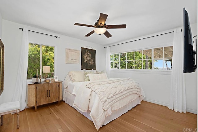 17030 Grand Ave, Lake Elsinore, CA 92530 - bedroom featuring light wood-type flooring and ceiling fan