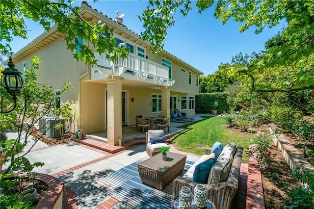 48 Via Porto Grande, Rancho Palos Verdes, CA 90275 - back of property featuring a balcony, a patio area, stucco siding, and a lawn
