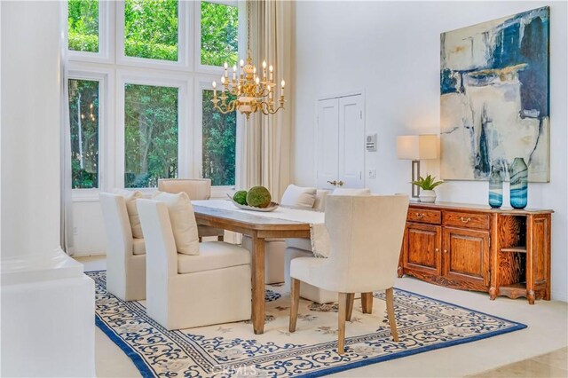 48 Via Porto Grande, Rancho Palos Verdes, CA 90275 - dining space featuring a chandelier, healthy amount of natural light, and a towering ceiling