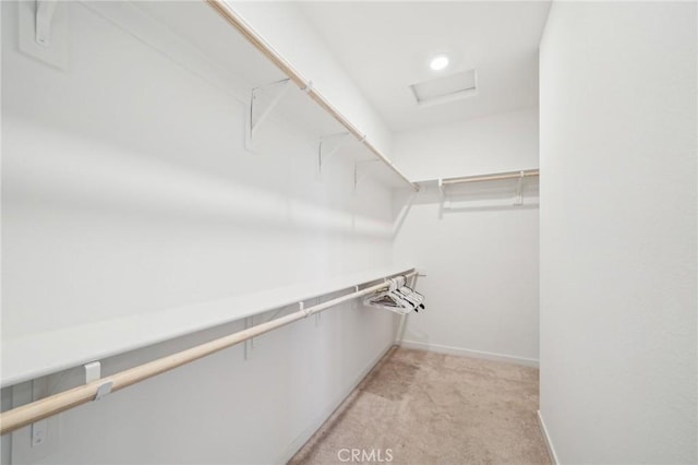 16233 Lozano St Unit 2, Fontana, CA 92336 - spacious closet featuring light colored carpet and attic access