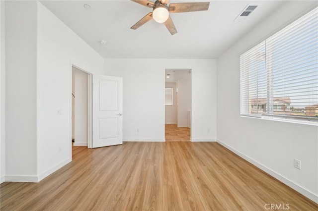 16233 Lozano St Unit 2, Fontana, CA 92336 - unfurnished bedroom featuring light wood finished floors, baseboards, and a ceiling fan