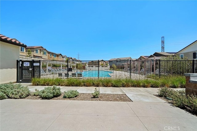 16233 Lozano St Unit 2, Fontana, CA 92336 - community pool featuring a residential view