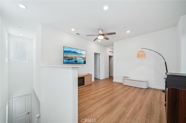 16233 Lozano St Unit 2, Fontana, CA 92336 - unfurnished living room with ceiling fan, light wood-style flooring, recessed lighting, and baseboards