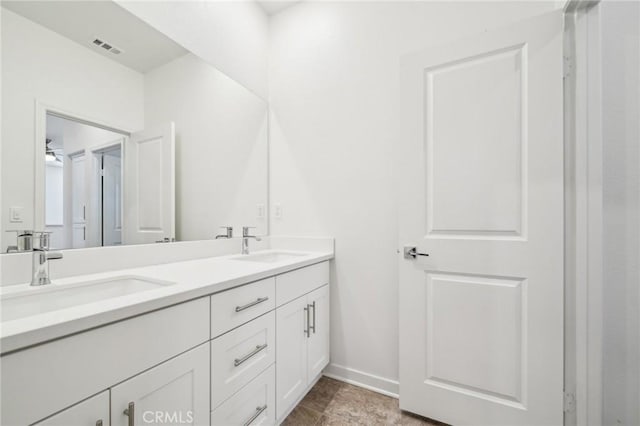 16233 Lozano St Unit 2, Fontana, CA 92336 - bathroom with double vanity and baseboards