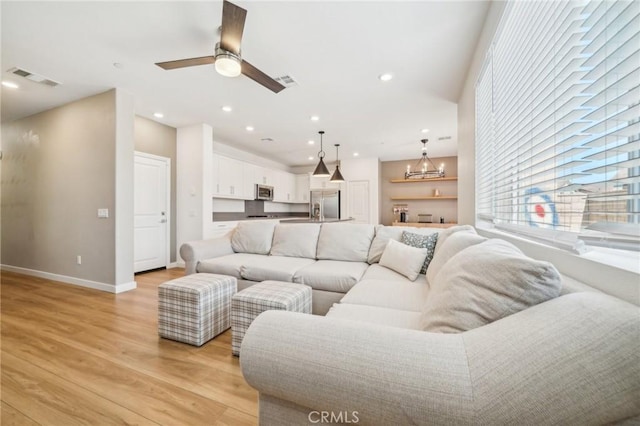 16233 Lozano St Unit 2, Fontana, CA 92336 - living area with light wood finished floors, baseboards, a ceiling fan, and recessed lighting