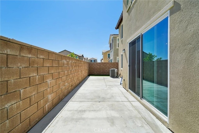 16233 Lozano St Unit 2, Fontana, CA 92336 - fenced backyard with central AC unit and a patio