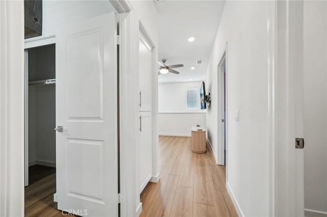 16233 Lozano St Unit 2, Fontana, CA 92336 - hallway with light wood finished floors, baseboards, and recessed lighting