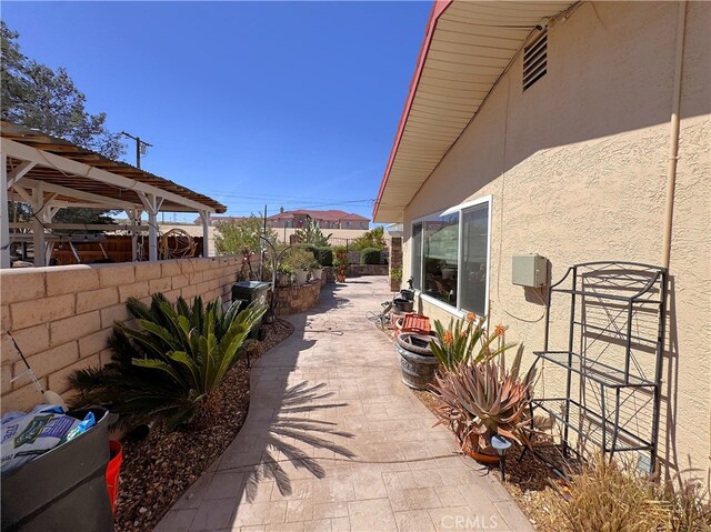 27568 Linda Vista Rd, Barstow, CA 92311 - fenced backyard with a patio area