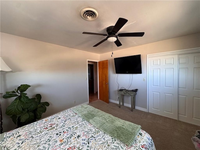 27568 Linda Vista Rd, Barstow, CA 92311 - carpeted bedroom featuring baseboards, a ceiling fan, and a closet