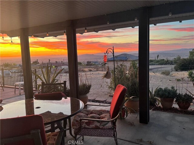 27568 Linda Vista Rd, Barstow, CA 92311 - view of patio / terrace with a mountain view and outdoor dining area