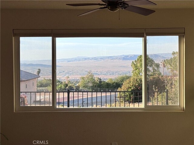 27568 Linda Vista Rd, Barstow, CA 92311 - detailed view of a ceiling fan and a mountain backdrop