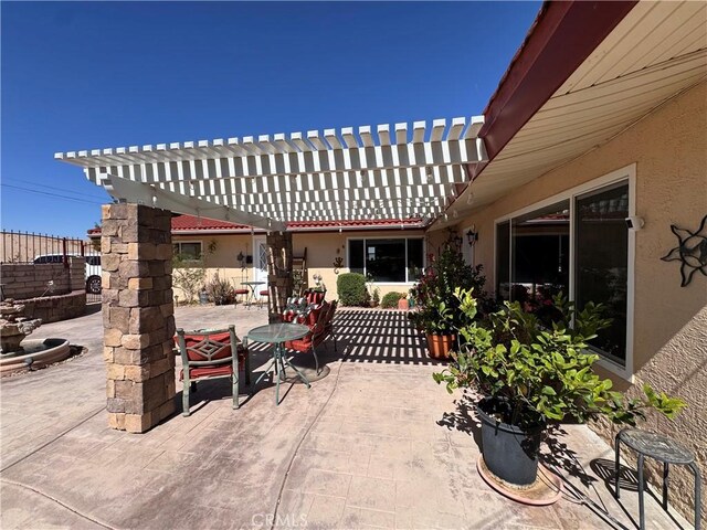 27568 Linda Vista Rd, Barstow, CA 92311 - view of patio / terrace with outdoor dining space and a pergola