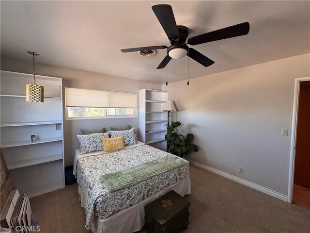 27568 Linda Vista Rd, Barstow, CA 92311 - carpeted bedroom featuring baseboards and ceiling fan