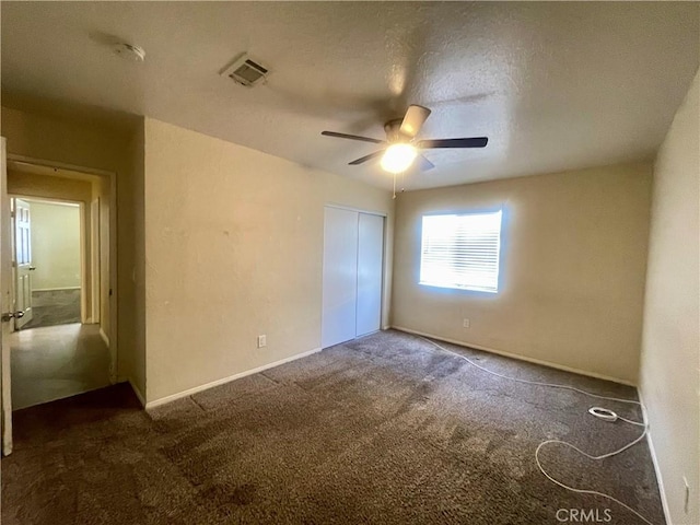 1305 Herzel Ave, Lancaster, CA 93535 - unfurnished bedroom featuring carpet flooring, a closet, a ceiling fan, and baseboards