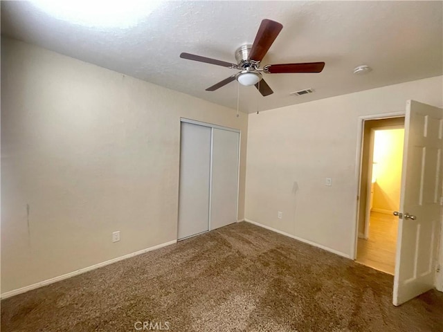 1305 Herzel Ave, Lancaster, CA 93535 - unfurnished bedroom featuring carpet flooring, a closet, baseboards, and ceiling fan