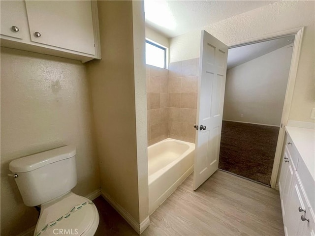 1305 Herzel Ave, Lancaster, CA 93535 - bathroom with toilet, baseboards, vanity, and wood finished floors
