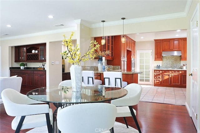 251 W Le Roy Ave, Arcadia, CA 91007 - dining area with hardwood / wood-style flooring, ornamental molding, and recessed lighting