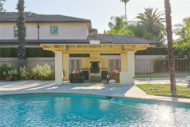 251 W Le Roy Ave, Arcadia, CA 91007 - back of house with a tile roof, a patio, brick siding, and a gazebo