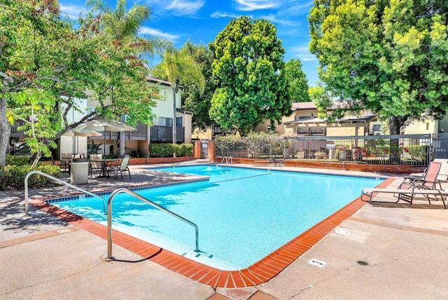 7930 Mission Center Ct Unit F, San Diego, CA 92108 - community pool featuring a patio