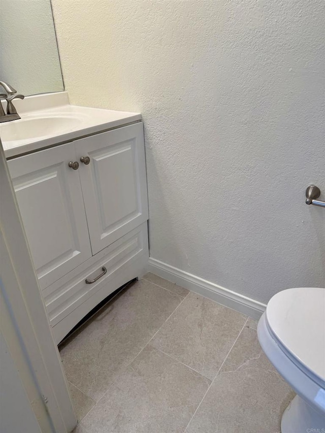 7930 Mission Center Ct Unit F, San Diego, CA 92108 - bathroom featuring vanity, a textured wall, and tile patterned floors