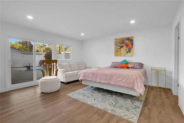 5548 Irondale Ave, Los Angeles, CA 91367 - bedroom featuring access to exterior, wood finished floors, recessed lighting, and baseboards