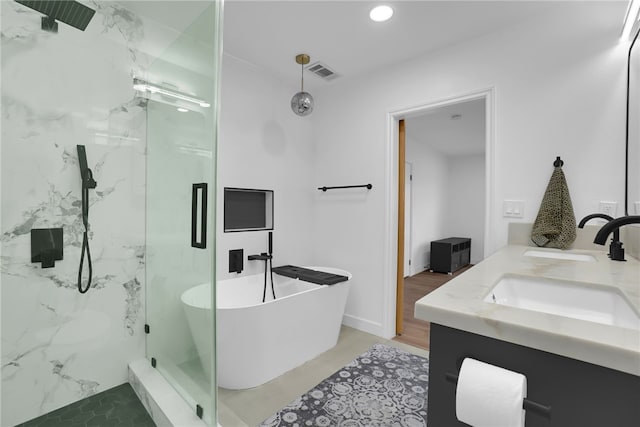 5548 Irondale Ave, Los Angeles, CA 91367 - bathroom with a marble finish shower, a freestanding tub, double vanity, and recessed lighting