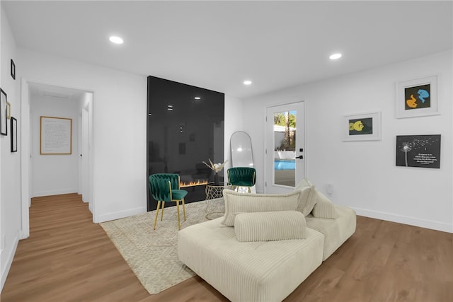 5548 Irondale Ave, Los Angeles, CA 91367 - living room with wood finished floors, baseboards, and recessed lighting