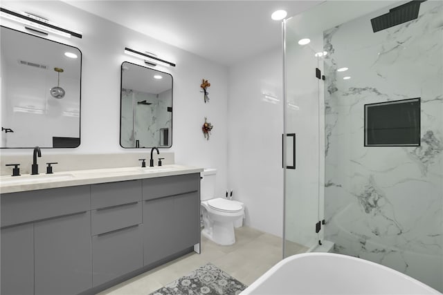 5548 Irondale Ave, Los Angeles, CA 91367 - full bathroom with double vanity, a marble finish shower, a soaking tub, and toilet