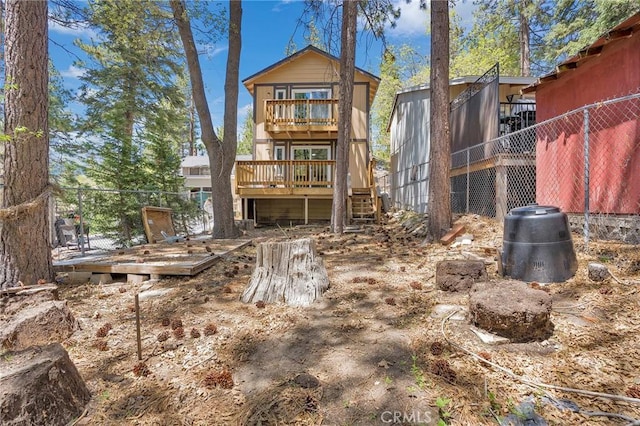 33079 Ridge Rd, Arrowbear, CA 92382 - rear view of house with a deck, stairs, and a balcony
