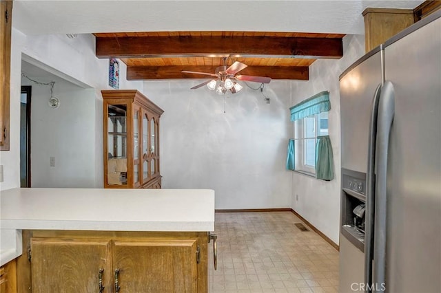 33079 Ridge Rd, Arrowbear, CA 92382 - kitchen with stainless steel refrigerator with ice dispenser, ceiling fan, light flooring, a peninsula, and light countertops