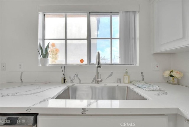 4315 W 145th St Unit 10, Lawndale, CA 90260 - kitchen featuring a sink, white cabinetry, and light stone counters