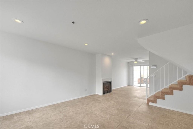 4315 W 145th St Unit 10, Lawndale, CA 90260 - unfurnished living room featuring recessed lighting, a ceiling fan, stairs, a fireplace, and baseboards