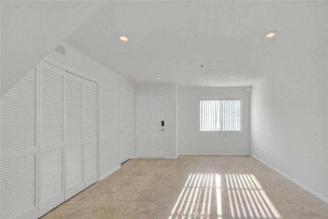 4315 W 145th St Unit 10, Lawndale, CA 90260 - hall with recessed lighting, light tile patterned floors, and baseboards