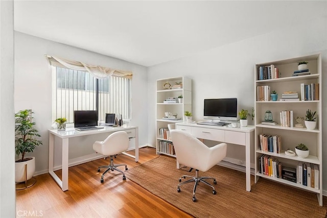 11952 Darlington Ave Unit 6, Los Angeles, CA 90049 - home office with wood finished floors