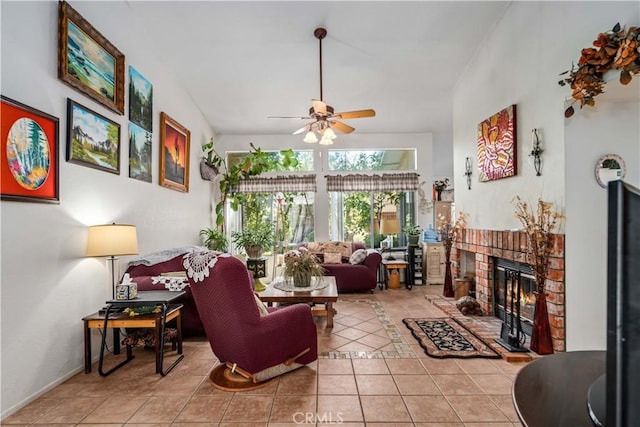 44044 11th St E, Lancaster, CA 93535 - living room featuring tile patterned flooring, a ceiling fan, and a fireplace
