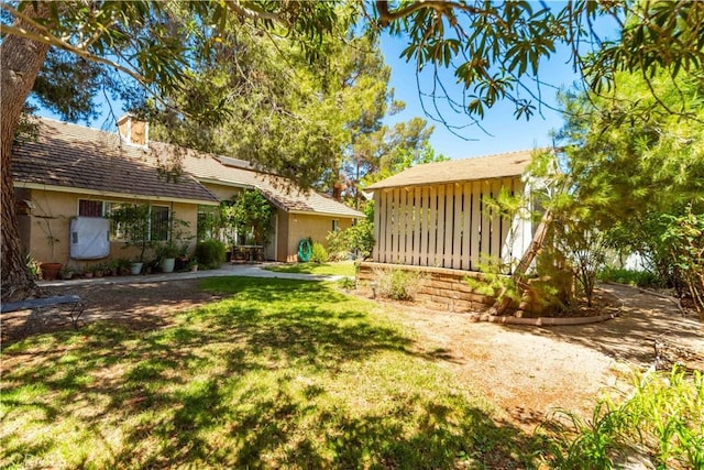 44044 11th St E, Lancaster, CA 93535 - view of green lawn featuring an outbuilding
