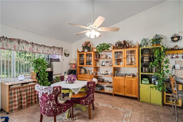 44044 11th St E, Lancaster, CA 93535 - dining area with a ceiling fan, vaulted ceiling, and light tile patterned floors