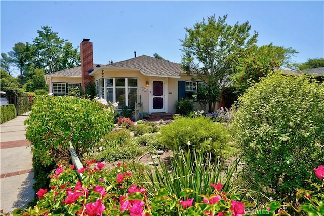 2042 E Crary St, Pasadena, CA 91104 - view of front of house featuring a chimney and stucco siding