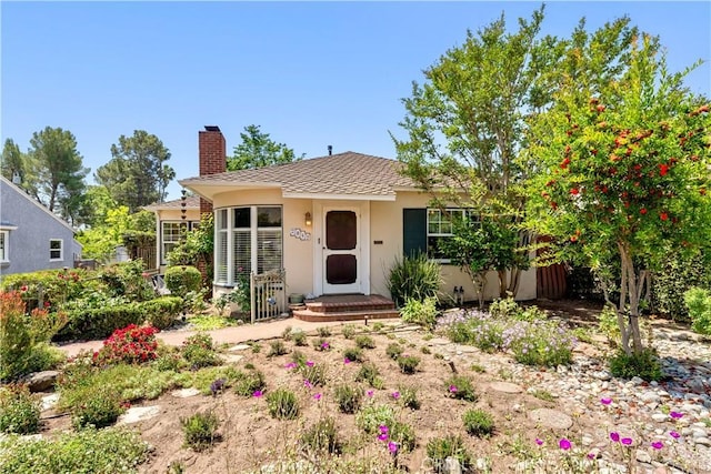 2042 E Crary St, Pasadena, CA 91104 - view of front of house featuring a chimney and stucco siding
