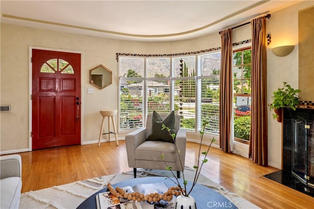 2042 E Crary St, Pasadena, CA 91104 - entryway with wood finished floors, baseboards, and healthy amount of natural light