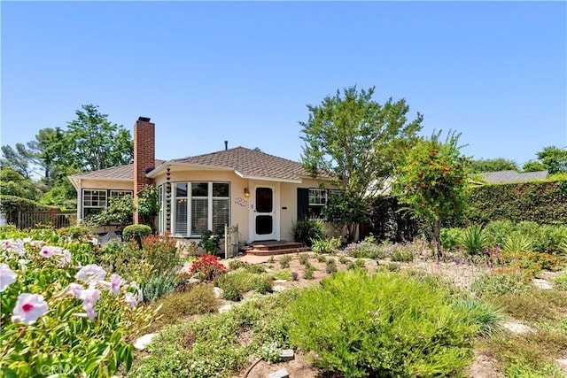 2042 E Crary St, Pasadena, CA 91104 - rear view of house featuring a chimney and stucco siding
