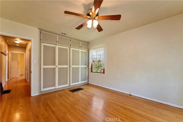 2042 E Crary St, Pasadena, CA 91104 - unfurnished bedroom featuring wood finished floors, baseboards, and ceiling fan