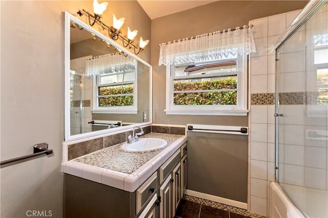 2042 E Crary St, Pasadena, CA 91104 - bathroom featuring vanity, enclosed tub / shower combo, plenty of natural light, and tile patterned flooring