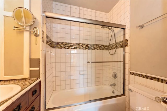 2042 E Crary St, Pasadena, CA 91104 - bathroom featuring enclosed tub / shower combo, toilet, and vanity