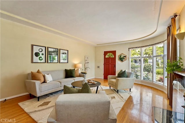 2042 E Crary St, Pasadena, CA 91104 - living area with baseboards and light wood-style floors