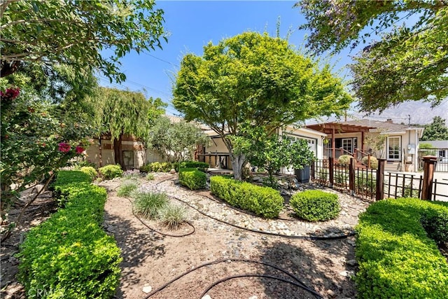 2042 E Crary St, Pasadena, CA 91104 - fenced front yard with a pergola