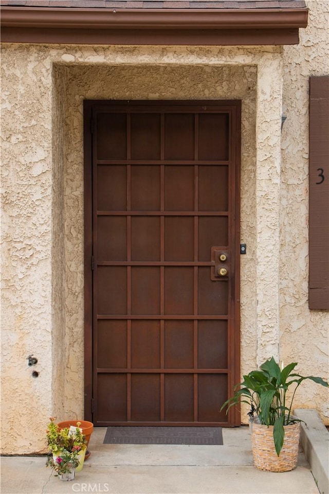 916 E 65th St Unit 3, Inglewood, CA 90302 - property entrance with stucco siding