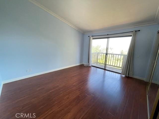 22809 Chardonnay Dr Unit 2, Diamond Bar, CA 91765 - spare room featuring ornamental molding, dark wood-style floors, and baseboards