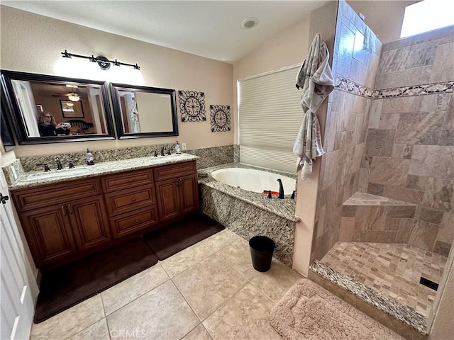 915 Beach Dr, Needles, CA 92363 - bathroom with a bath, tile patterned flooring, double vanity, and tiled shower