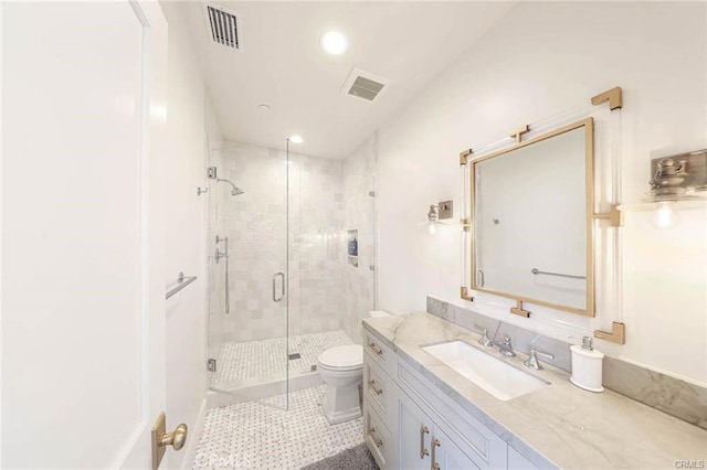 32 Bargemon, Newport Coast, CA 92657 - bathroom featuring vanity, a stall shower, toilet, recessed lighting, and tile patterned floors